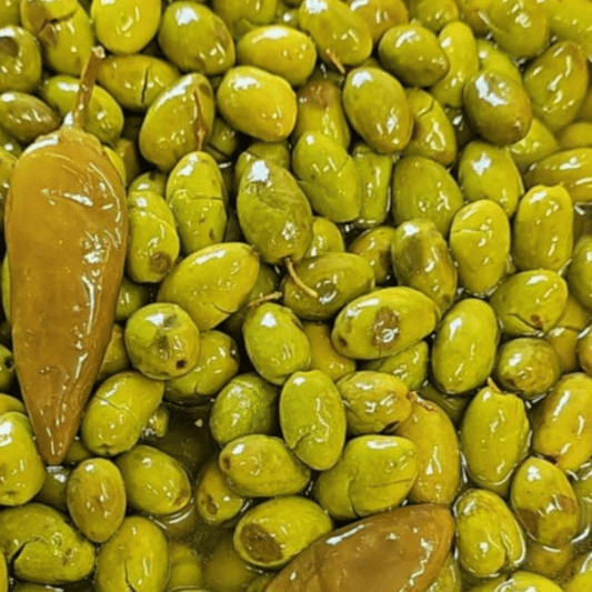 Cracked Green Baladi Olives in brine from Tulkarm.