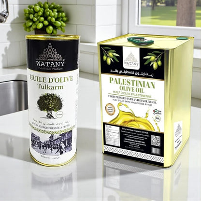 Two containers of Watany olive oil on a kitchen counter.